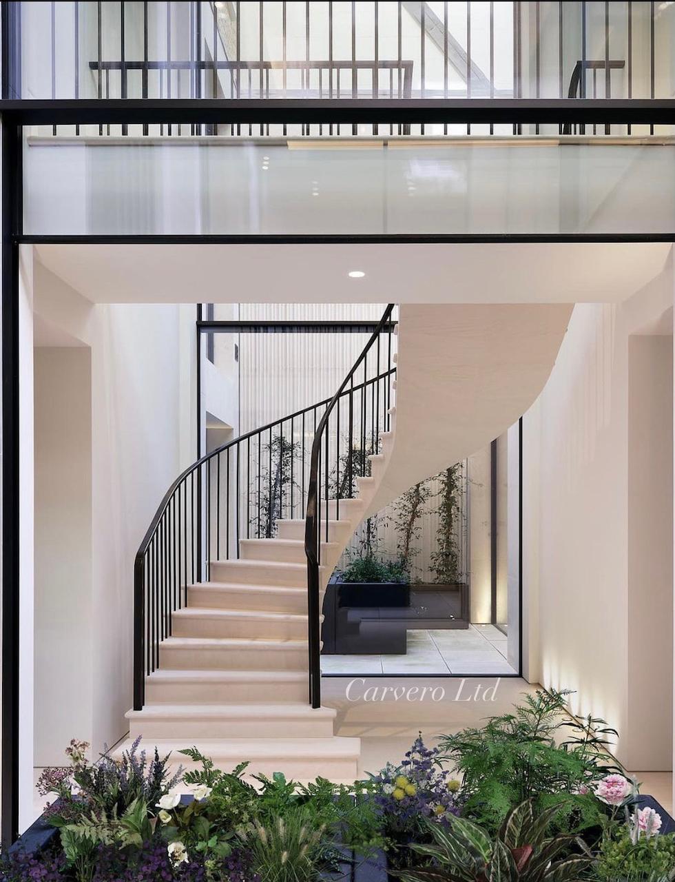 Post-tensioned stone staircase - Kensington, London | Carvero