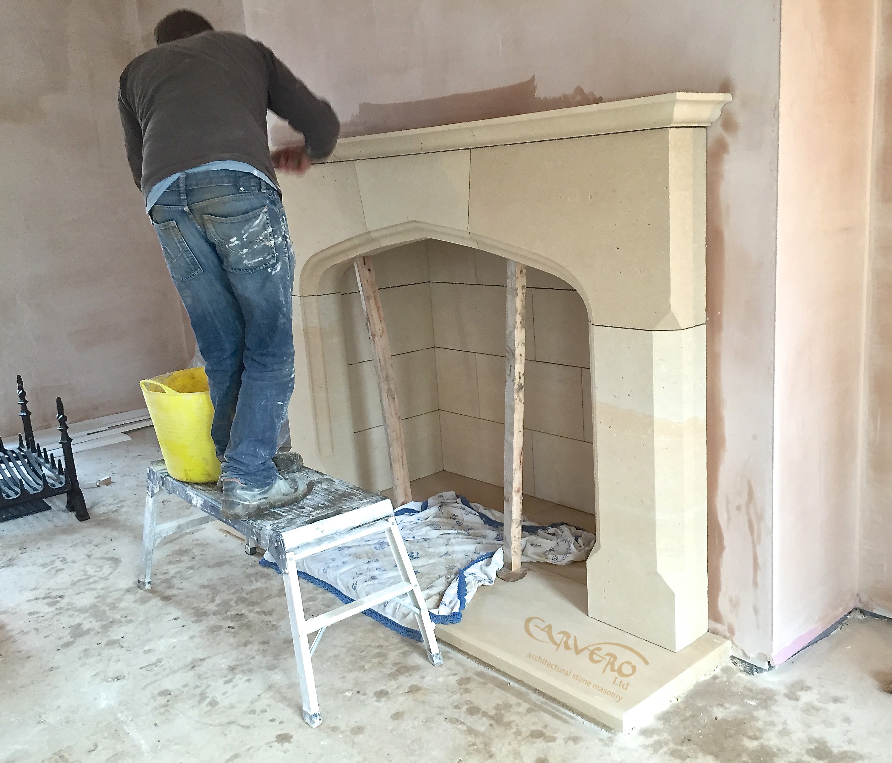 Large stone fireplace installed by Leicestershire based stonemason Carvero