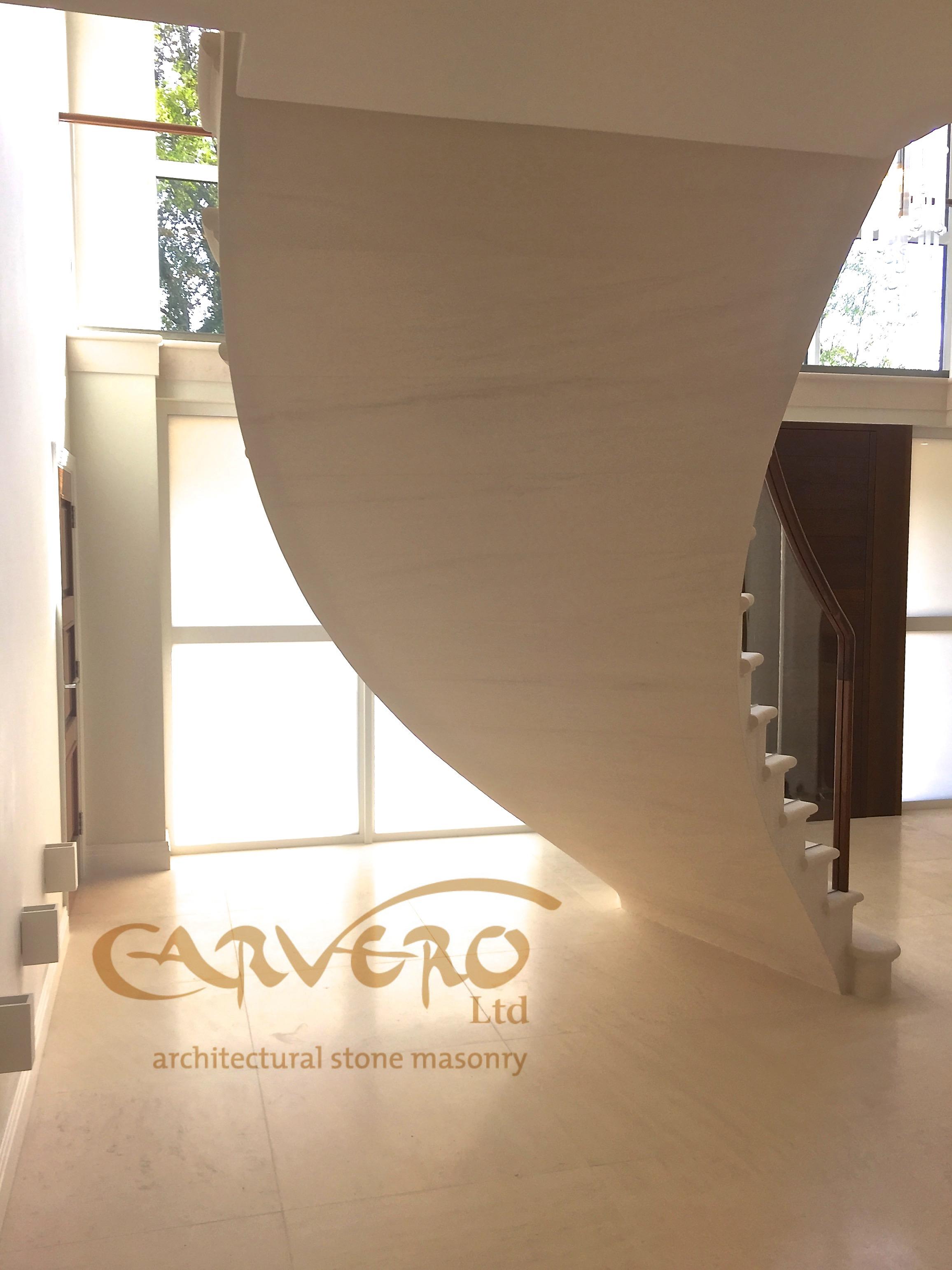 A floating stone staircase, soffit detail by Carvero at Warlingham, Surrey