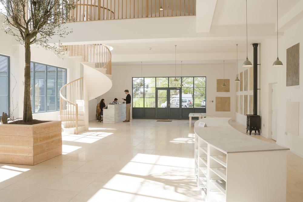 view from the back of the room with spiral stone staircase