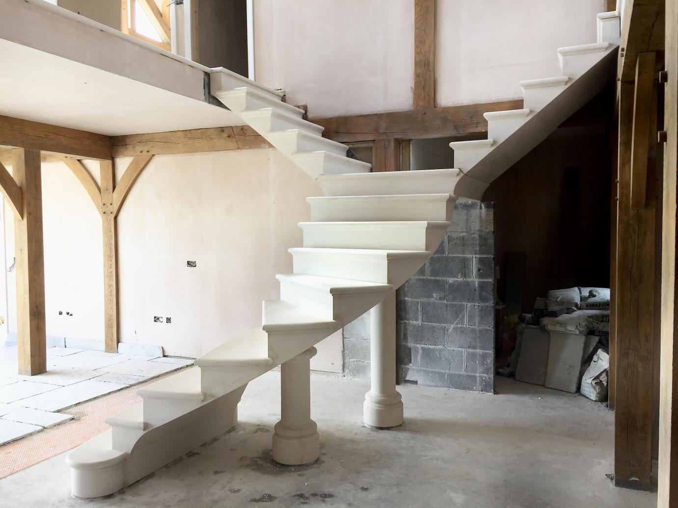 Floating post tensioned stone stair